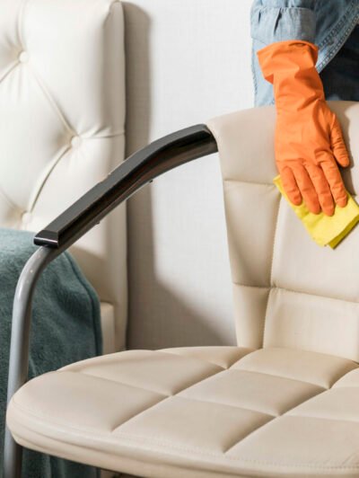 front-view-woman-cleaning-chair