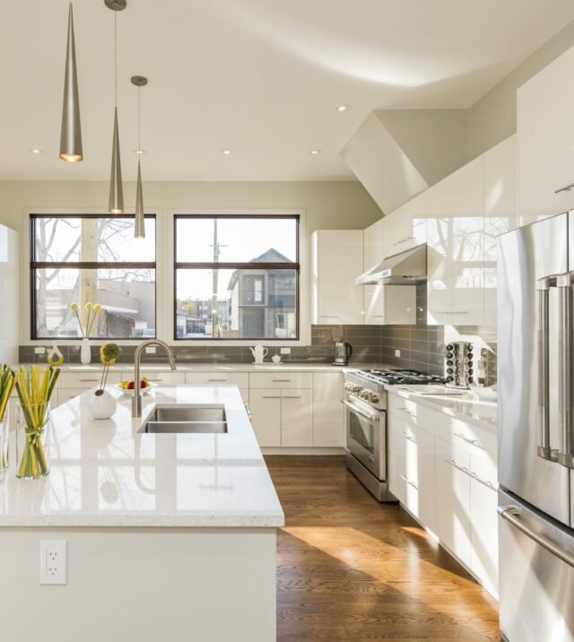 A beautiful shot of a modern house kitchen